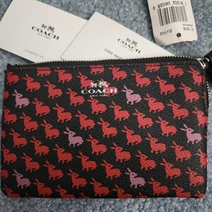NWT Coach Black Wristlet with Red and Purple Bunny Design